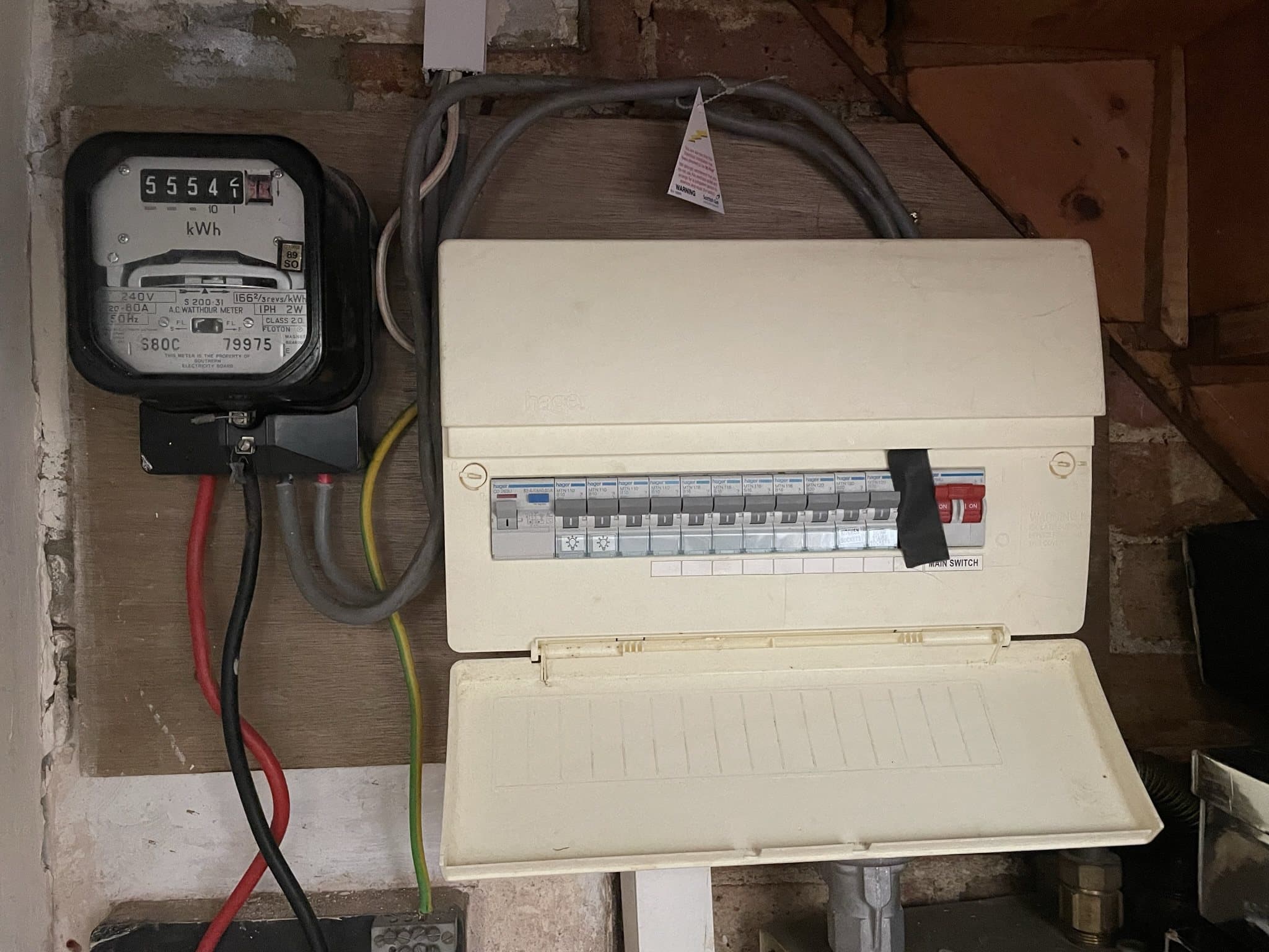 Older plastic consumer unit before replacement